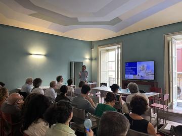 claudio gulli welcomes the group at the palazzo butera